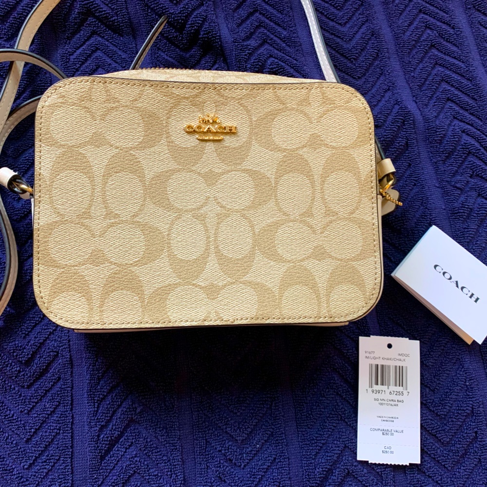 NWT- Coach mini camera crossover bag. Cream